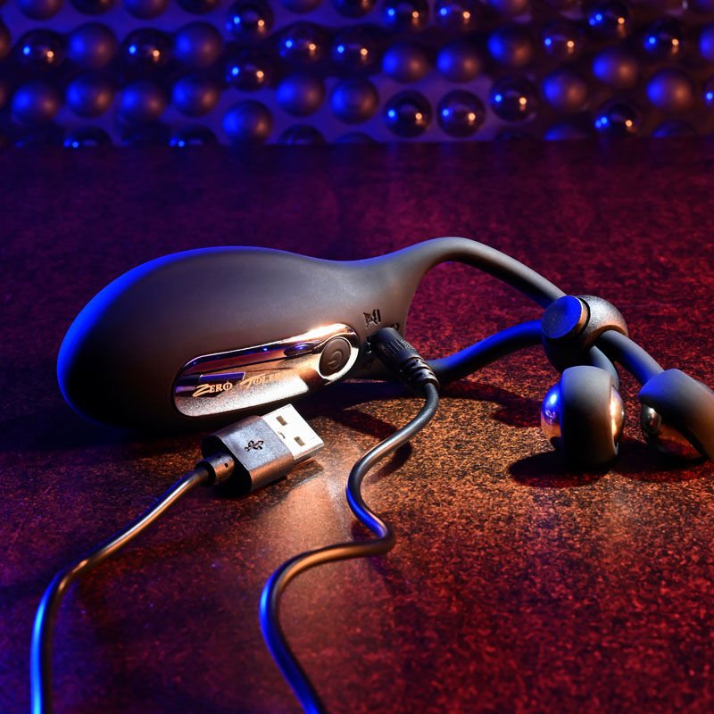 Zero tolerance -  the big bang - vibrating cock ring - Product side view, in a hand  | Flirtybay